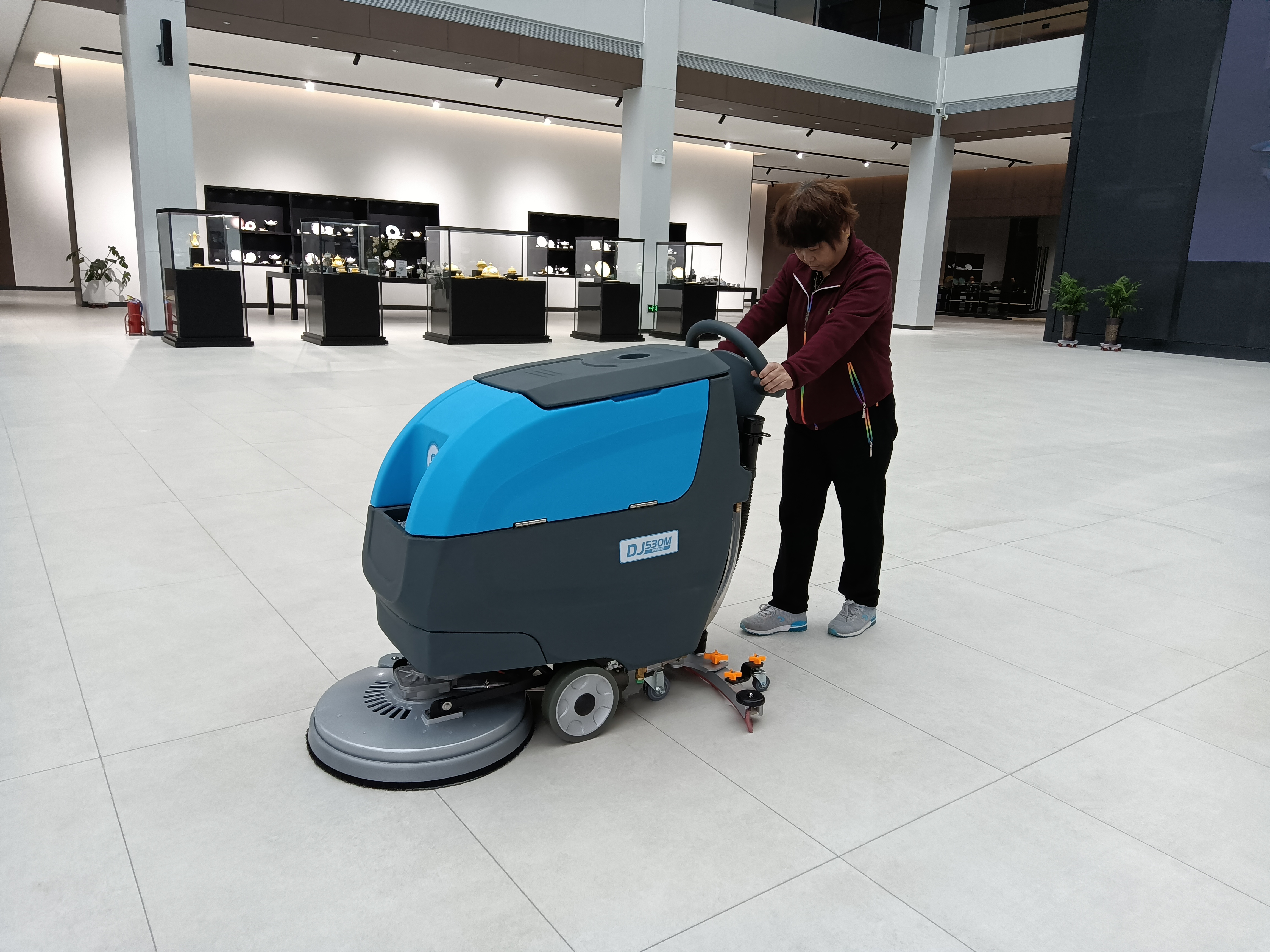 What is an industrial floor scrubber?