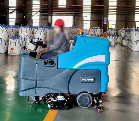 How can I determine if my working conditions are suitable for using a floor scrubber?