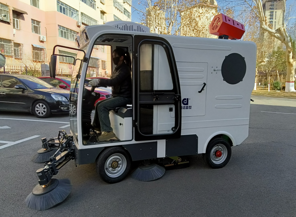 What types of debris can industrial sweepers handle?