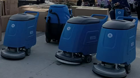What should be noted when using industrial floor scrubbers?
