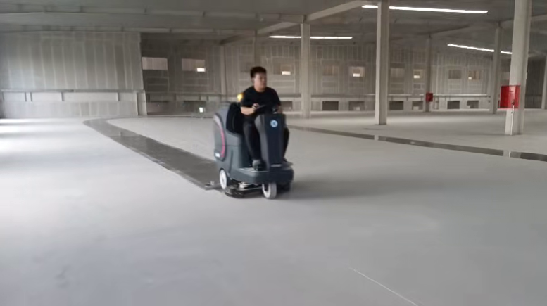 VDJ870M Ride on Scrubber Shines  Powerful Cleaning Demo on Epoxy Floor at Client  Warehouse Zibo Dingjie Shengshi
